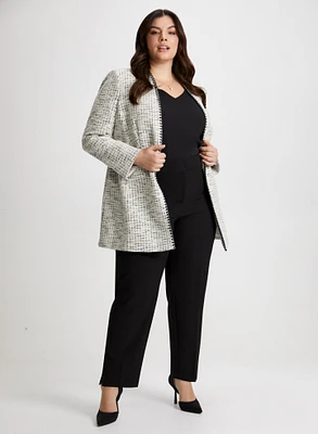 Veste en tissu bouclé et pantalon coupe cité