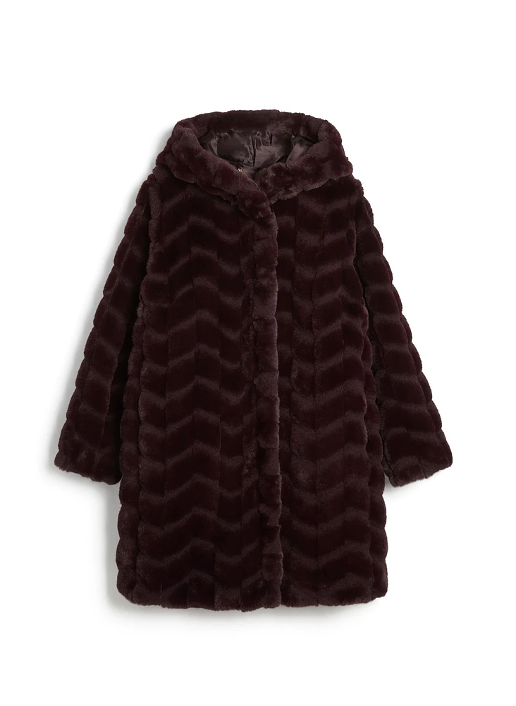 Manteau en fausse fourrure à capuchon