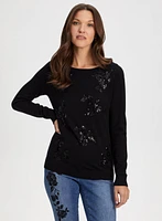 Pull à empiècements floraux en sequins