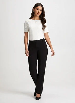 Haut péplum et pantalon coupe moderne