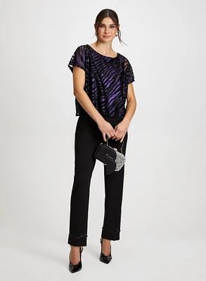 Blouse zébrée et pantalon à perles