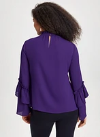 Blouse à col smocké et manches bouffantes