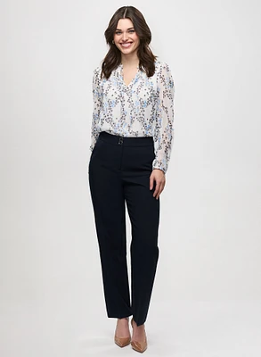 Blouse florale à col volanté et pantalon à jambe droite