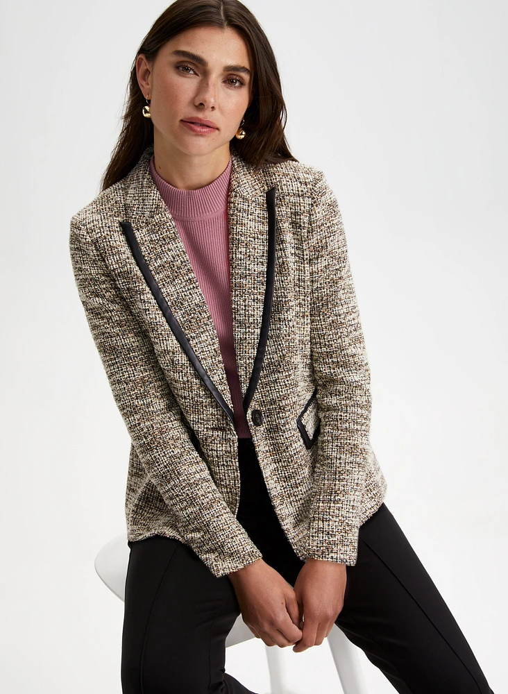 Blazer en tissu bouclé et détails faux cuir