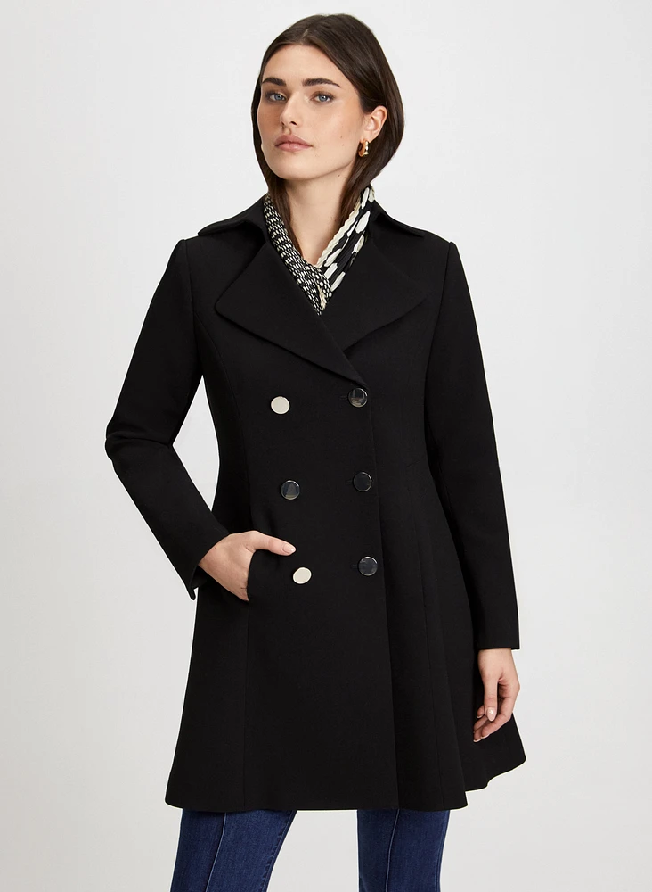 Manteau long et évasé en tricotine