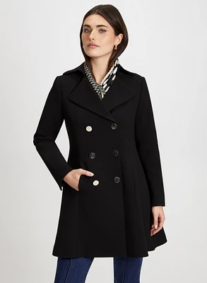 Manteau long et évasé en tricotine