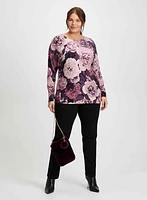 Pull à motif floral et jean noir étroit