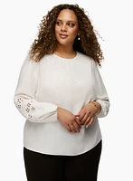 Blouse à manches longues détails ajourés