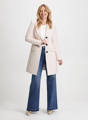 Manteau en tricotine et jean large