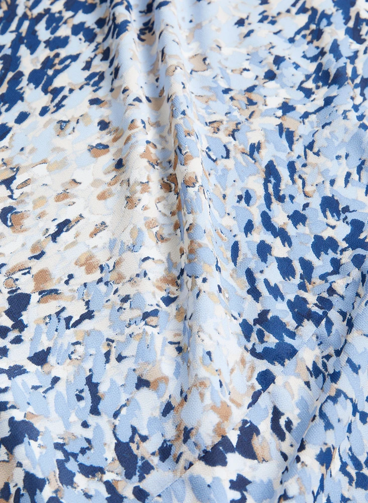 Blouse imprimée à volants