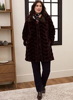 Manteau en fausse fourrure à capuchon