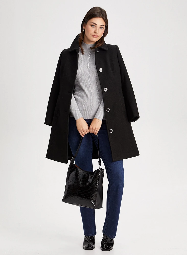 Manteau en mélange de laine et sac à main texturé