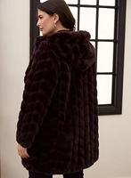 Manteau en fausse fourrure à capuchon