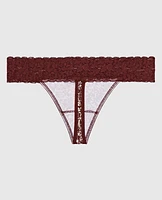 Tanga avec bordure en dentelle