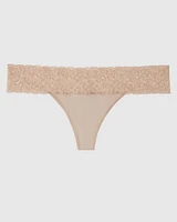 Tanga avec bordure en dentelle