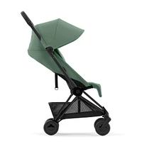 Poussette Coya - Cadre noir mat avec siège vert feuillage