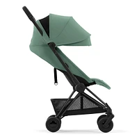 Poussette Coya - Cadre noir mat avec siège vert feuillage
