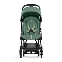 Poussette Coya - Cadre noir mat avec siège vert feuillage