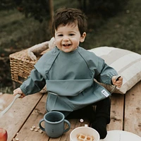 Long-sleeved Bib with integrated pocket 6-24m