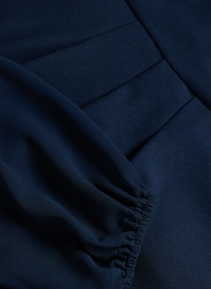 Robe plissée à manches bouffantes