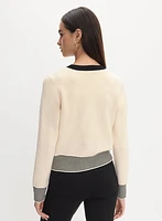 Cardigan à bordures contrastantes et boutons dorés