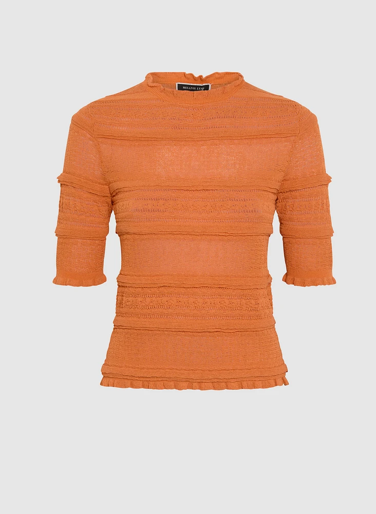 Pull en tricot à ourlet ondulé