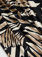 Pantalon à jambe large motif feuilles
