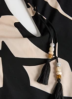 Robe asymétrique à motif de feuilles