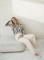 Pantalon à jambe évasée ceinture contrastante