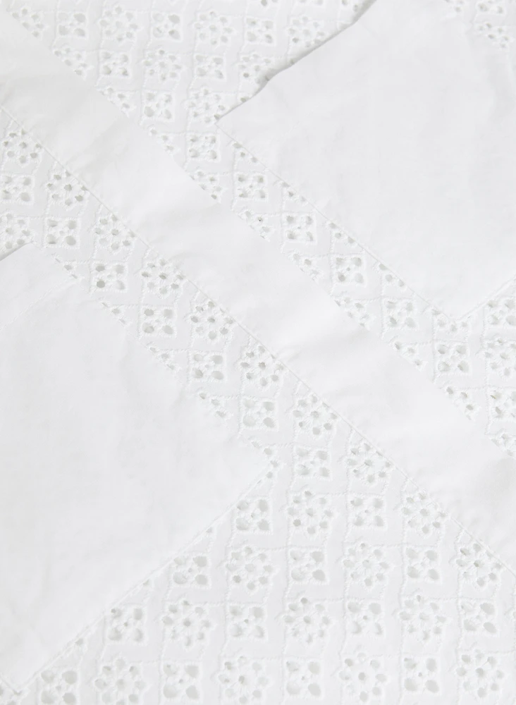 Blouse à détails brodés