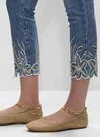 Jean à jambe droite et broderies
