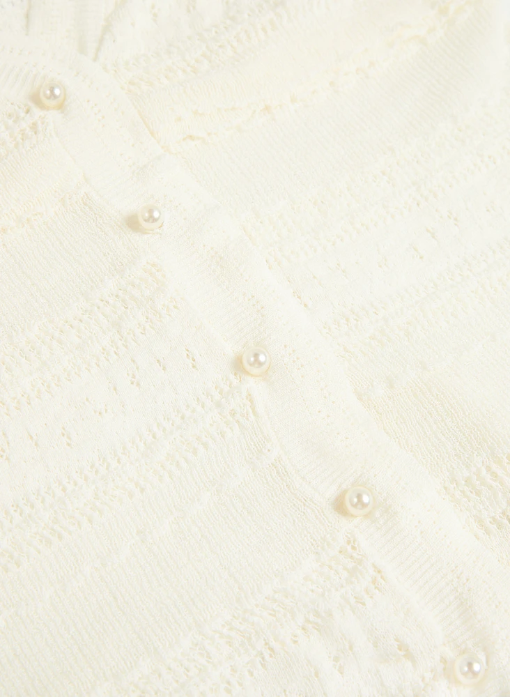 Cardigan en tricot à volants