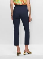 Pantalon à jambe étroite avec poches passepoilées