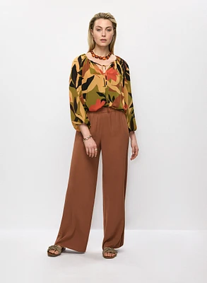 Blouse à col noué et pantalon à jambe large