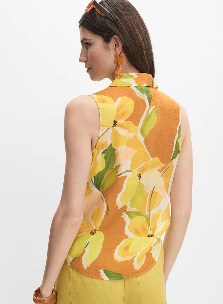 Blouse florale sans manches