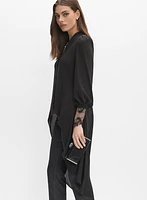 Blouse asymétrique à poignets en dentelle