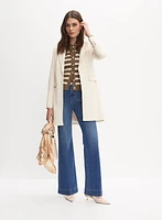 Veste longue à détails métalliques