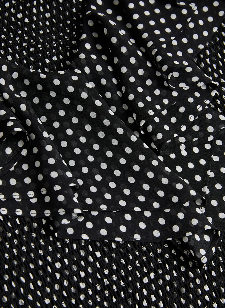 Blouse à pois et volants