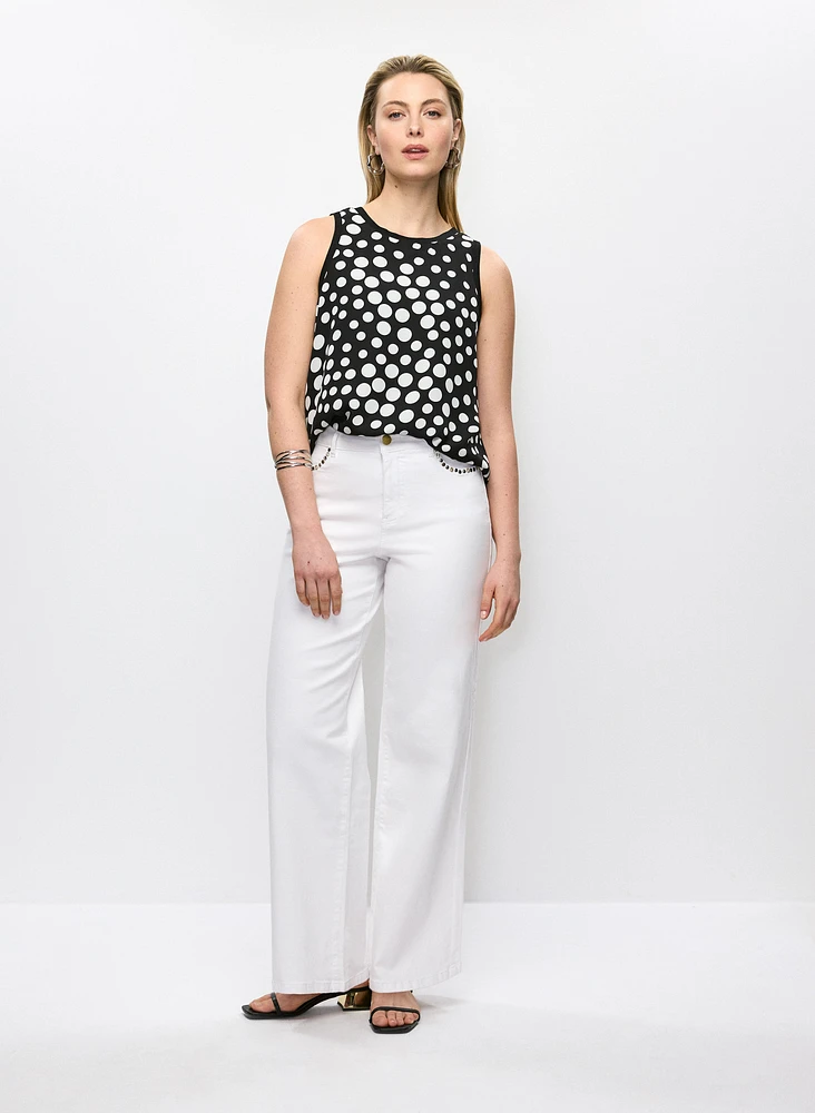 Blouse sans manches à pois et jean à jambe large