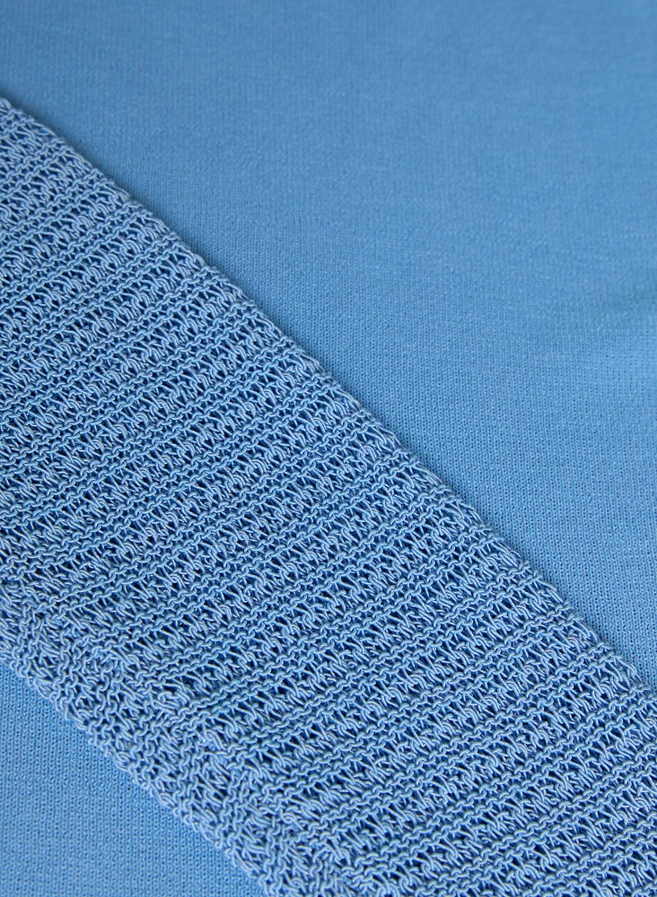 Pull à manches longues en tricot ajouré
