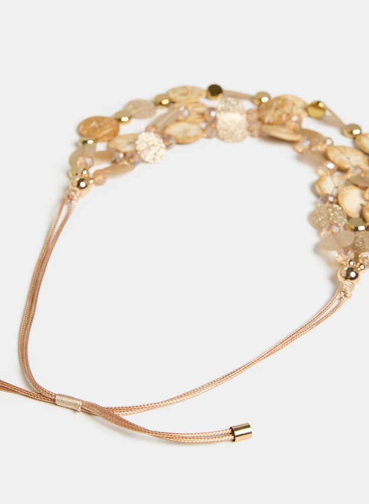 Collier à bois et à disque métallique