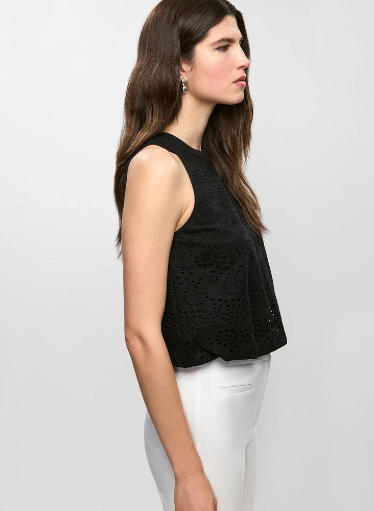 Blouse ras-du-cou sans manches à oeillets