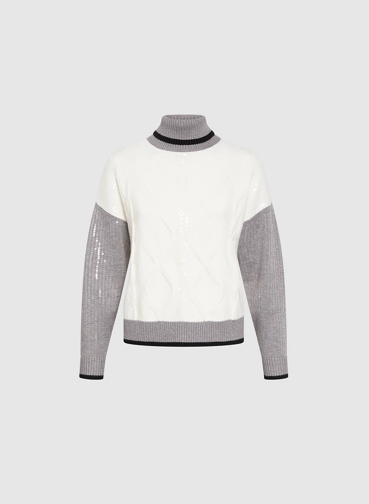 Pull à col roulé et paillettes