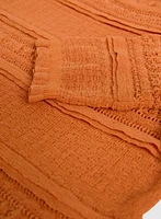 Pull en tricot à ourlet ondulé