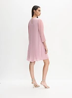 Robe à rosette en chiffon plissé