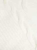 Pull à col roulé et paillettes