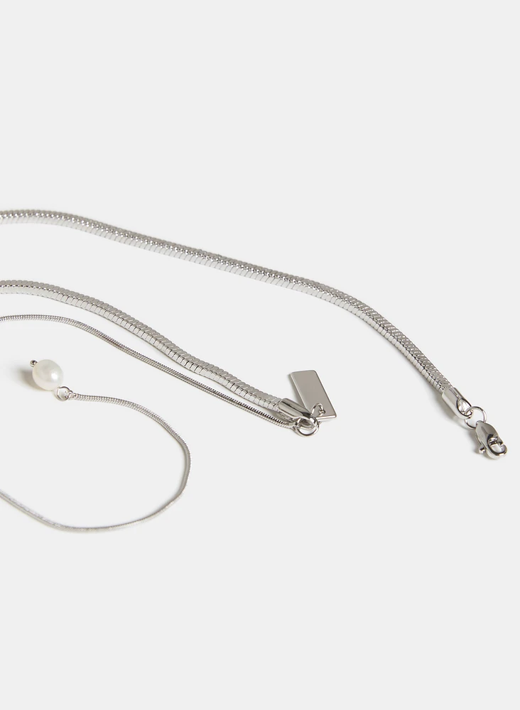 Collier à pendentif de perle