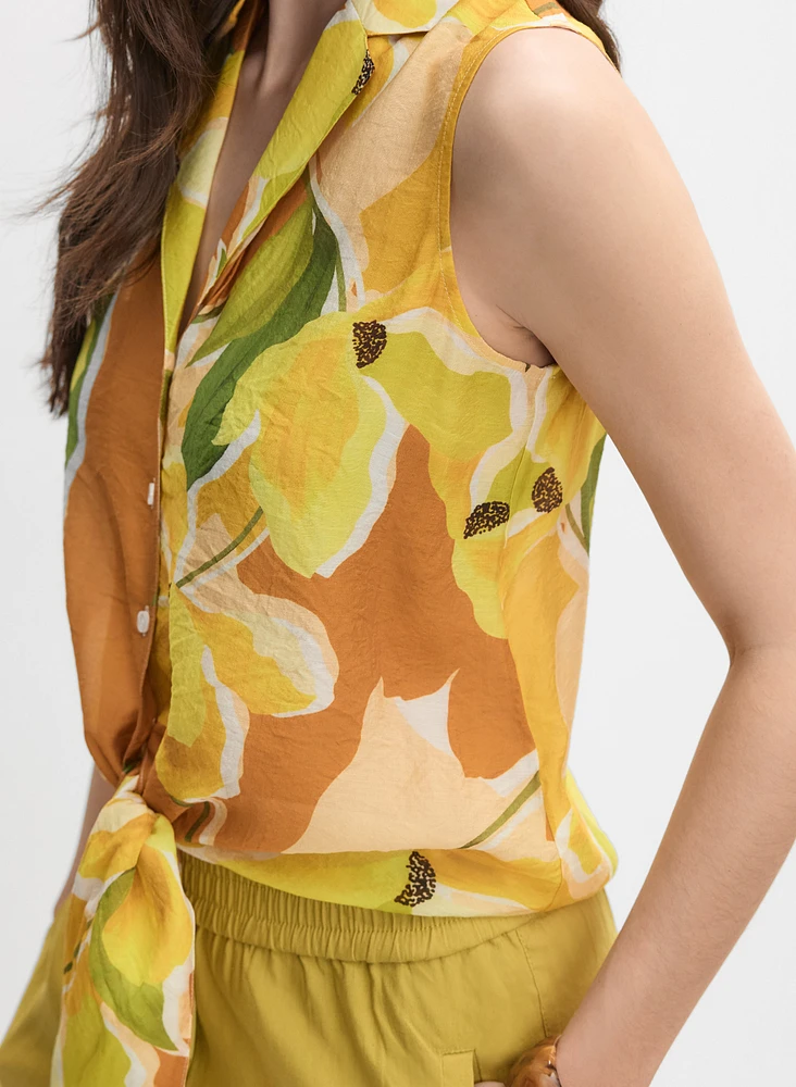 Blouse florale sans manches