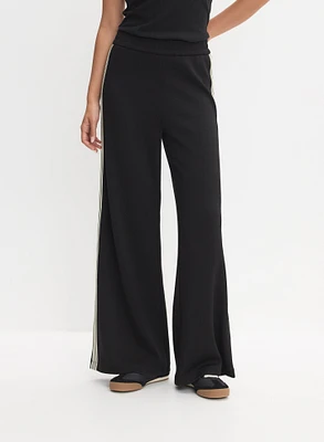 Pantalon à jambe large bandes contrastantes