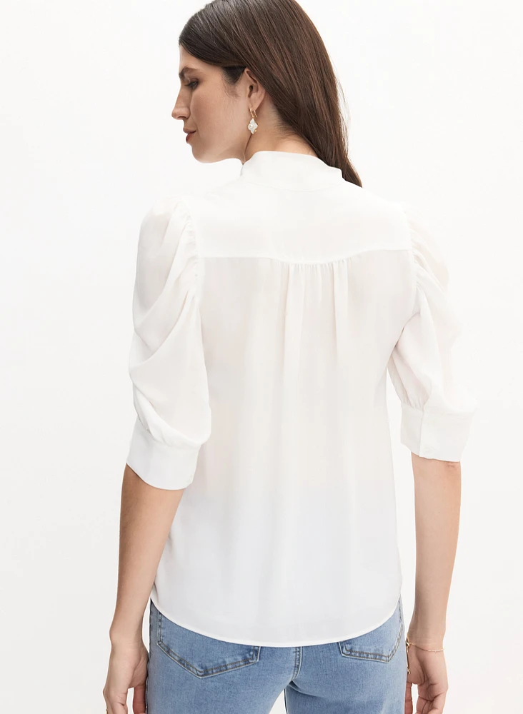 Blouse à col montant